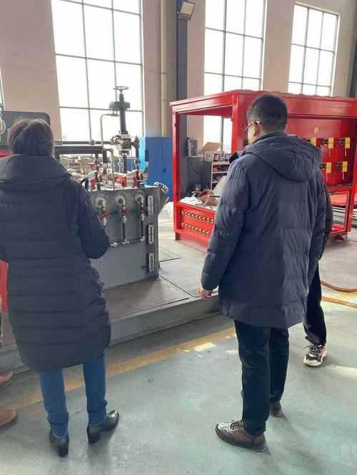 DEENPU Factory — Customers inspecting BOP control skid during factory visit